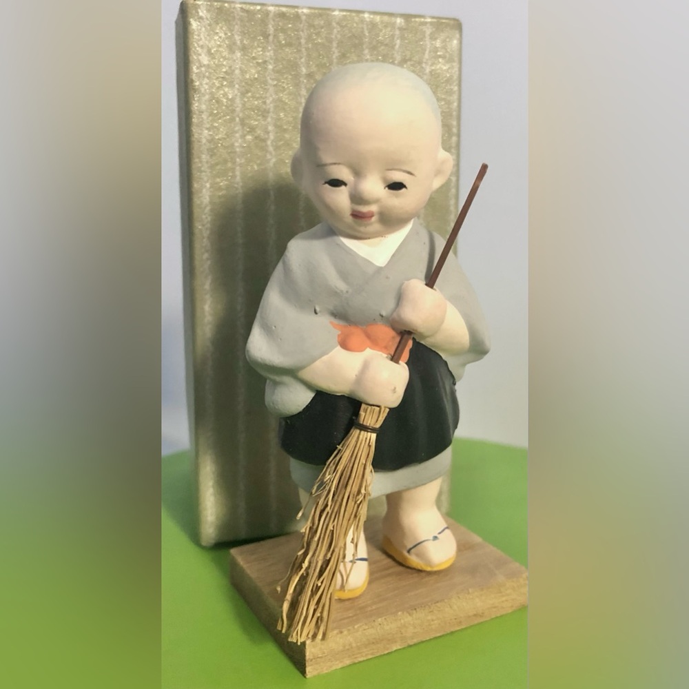 Vintage Japanese Buddhist Monk Sweeping with a Traditional Tatami Broomstick